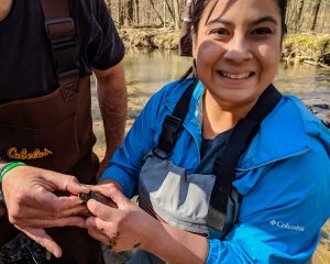 Viviana Ricardez, Vice President of conservation organization TexasTurtles.org, holding a juvenile Wood Turtle while volunteering with theTurtleRoom